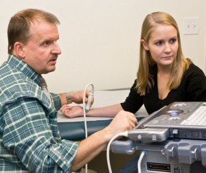Doctor administers an ultrasound