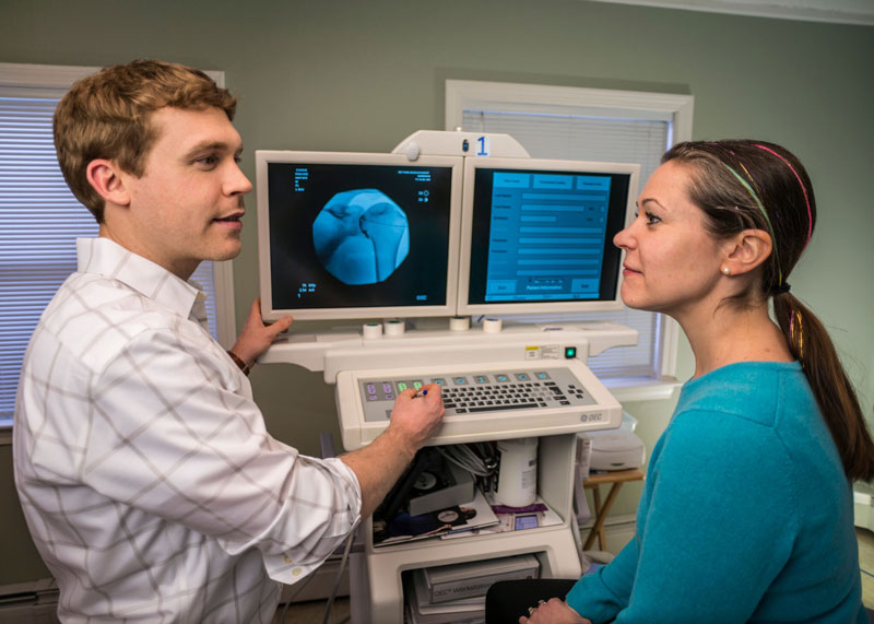 Doctor and patient review CT scan